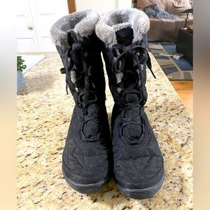 Woman’s Columbia black winter boots. Waterproof and warm. Worn 4xs. Size 7.5